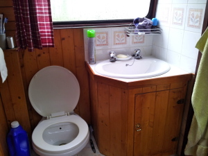 The toilet-bathroom is closing the corridor